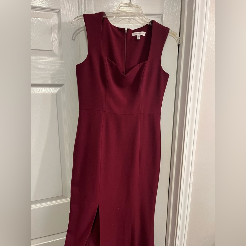 Dress The Population; sweetheart neckline burgundy gown